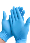Spolverizzi l'elastico blu eliminabile libero del commestibile dei guanti del nitrile